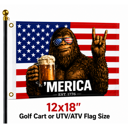 A 12x18 golf cart or UTV/ATV flag shown on a black pole against a white background. The flag features a cartoon Bigfoot wearing sunglasses with an American flag pattern, holding a beer mug and making a rock-on gesture, with the text "MERICA EST.