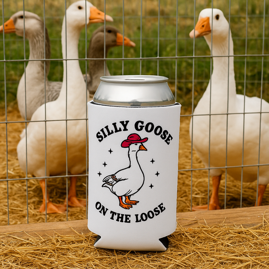 Can cooler with 'Silly Goose on the Loose' design in front of geese in a pen.
