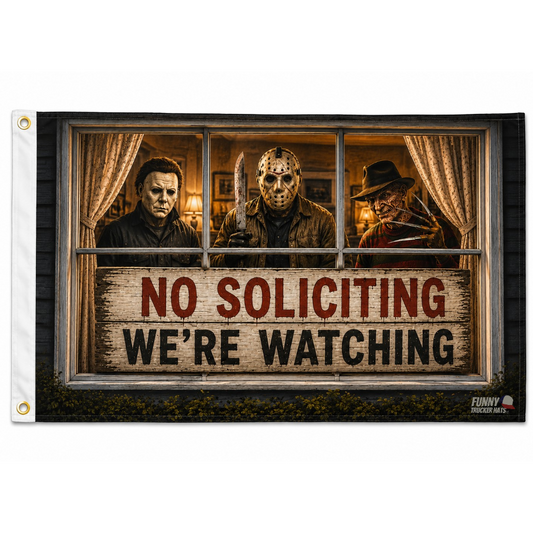 A rectangular novelty flag or banner with a horror-themed window scene showing three masked figures behind dark wood framing, with a large sign reading 'NO SOLICITING WE'RE WATCHING.' The left edge has a white header with metal grommets, and a small 'Funny Chicago Hats' mark appears in the lower right corner.