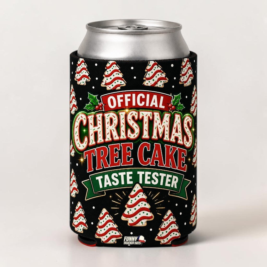 A silver aluminum can inside a black Christmas-themed can cooler sleeve. The sleeve features festive graphics including red and white striped candy canes, green holly leaves, and the text 'OFFICIAL CHRISTMAS TREE CAKE TASTE TESTER' in red, white, and green lettering.